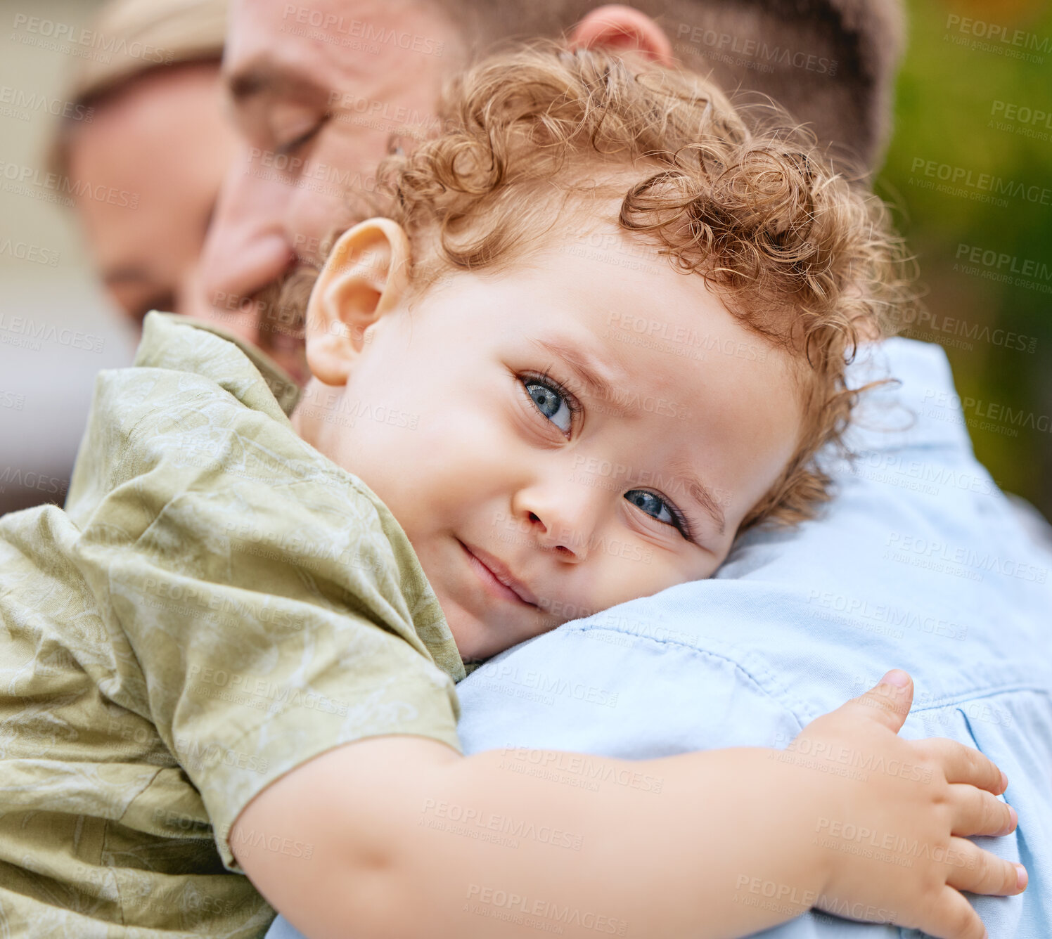 Buy stock photo Baby, love and family with a boy hugging his father while spending time with his mother outdoor together. Kids, bonding and care with a male toddler embracing a parent while outdoor at the park