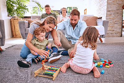 Buy stock photo Family, toys and kids play in living room home, having fun and bonding with parents. Love, child development and care of big family, grandpa and grandma, mom and father with kids playing with blocks.