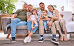 Happy big family, relax and smile on living room sofa for quality bonding time together at home. Portrait of family smiling and relaxing on couch for lounge break, weekend or holiday at the house