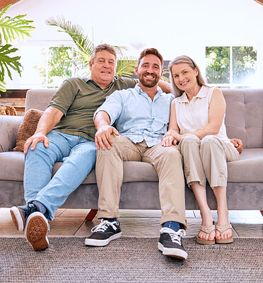 Buy stock photo Portrait, mother and father with adult son, happy and bonding together on sofa in living room. Family, mom and dad with grown male child being loving, smile and spend quality time in lounge on couch.