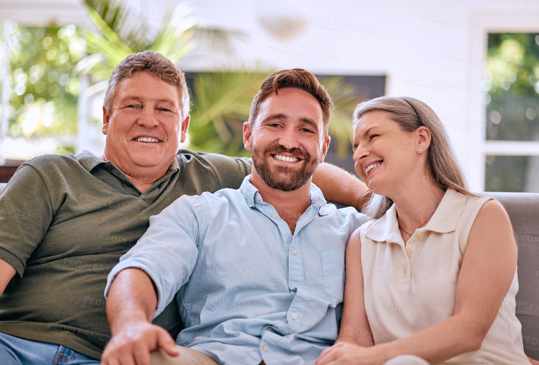 Buy stock photo Happy family, portrait and adults relax on a sofa with senior couple, son and laughing in a living room, quality time and adults. Love, face and family on a couch, bonding and happy in their home