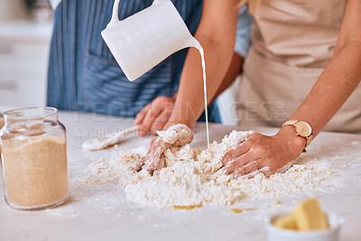 Buy stock photo Couple bake together, hands with dough in kitchen, for bonding and learning to be baker and baking skill together. Man, woman with flour and butter for pastry or bread, with cooking for love and fun.