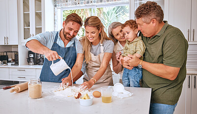 Buy stock photo Grandparents, parents and child baking in kitchen together making sweet treats for family. Love, bonding and big family together teaching, learning and making food with young boy in family home