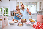 Baby birthday party, celebration and portrait of happy family celebrate event with kitchen table of snacks, cake and dessert food. Gift, present and kid chid with excited mother, father or parents