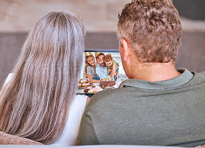 Buy stock photo Video call and senior couple celebrating grandchild birthday on a virtual call online. Mature man and woman celebrate family birthday party with video conference at home for happy birthday 

