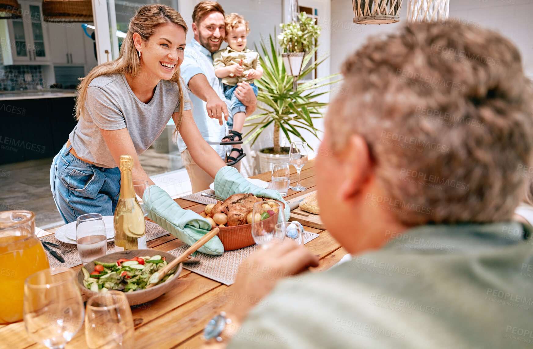 Buy stock photo Thanksgiving, celebration and family serving food, having lunch together in family home. Grandparents, parents and child ready to eat turkey on holiday, festival and vacation, celebrating tradition