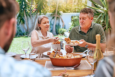 Buy stock photo Bbq, lunch and family in the garden for a celebration, relax and happy in summer together. Food, picnic and senior man and woman at a barbecue party with their children in a backyard of their house