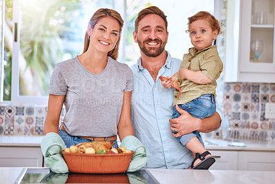 Buy stock photo Parents portrait, dad with baby in kitchen and cooking chicken casserole in family home with smile. Happy mom, father with child together with happiness on face and food for dinner, lunch or meal