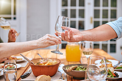 Wine glass, food and outdoor lunch of a man and woman hand ready for wine and eating. People hands help at the table for thanksgiving with alcohol drink and friends on a home patio in summer