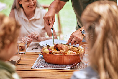 Buy stock photo Turkey lunch, family and man cut food for celebration event, happy family reunion and enjoy quality time together on home patio. Love, happiness and group of people eating chicken meal at brunch