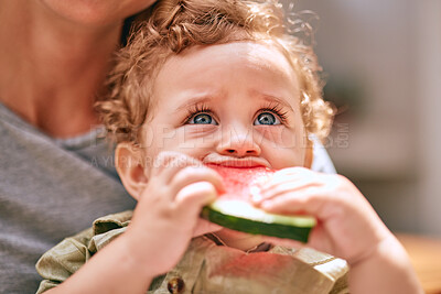 Buy stock photo Baby, water melon and cute with an infant boy child eating fruit with his mother in the home together. Food, health and summer with a young kid biting a piece of watermelon with his mom in a house