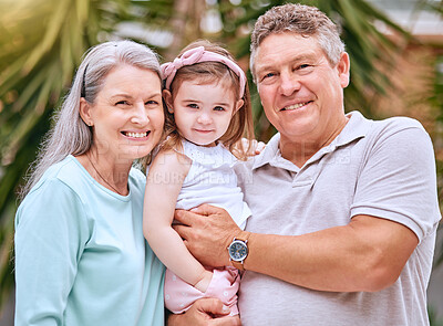 Buy stock photo Garden, family and grandparents portrait with young child smile for bond, care and happiness together. Happy, senior and grandmother with grandpa holding girl in Australia for retirement leisure.

