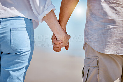 Buy stock photo Love, summer and old couple holding hands at beach enjoying ocean waves, blue sky and nature. Affection, bonding and loving man and woman taking romantic walk by sea on holiday, vacation and weekend