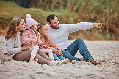Buy stock photo Family, travel and beach with children and parents on sand while pointing and learning about nature while on vacation, holiday or adventure. Man, woman and girl kids together for bonding outdoor