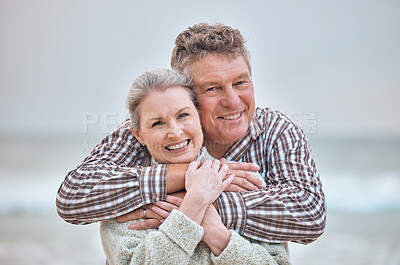 Buy stock photo Beach, hug and portrait of senior couple relaxing in Australia with smile, love and happiness on pension. Elderly, marriage and happy retirement people enjoy ocean walk break together.

