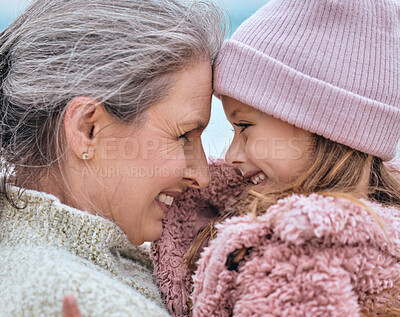 Buy stock photo Happy senior woman, family and girl spending quality time together in the park during autumn. Cute little child and her grandmother bonding outdoor and smile with love, care and happiness in winter