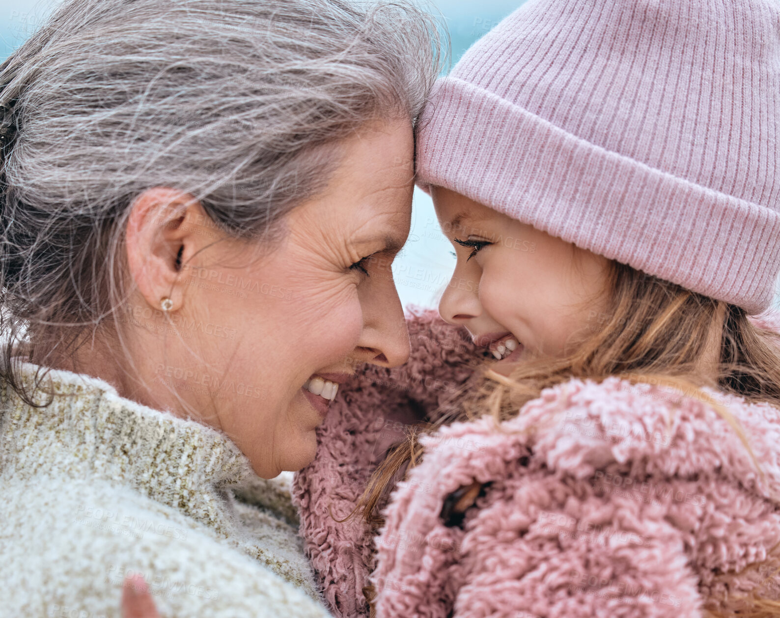 Buy stock photo Happy senior woman, family and girl spending quality time together in the park during autumn. Cute little child and her grandmother bonding outdoor and smile with love, care and happiness in winter