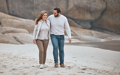 Buy stock photo Happy couple on beach, walking during date and travel, holiday together with love and care outdoor. Love, man and woman smile on romantic walk with sand, happiness and enjoy honeymoon in South Africa