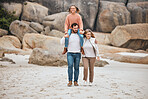 Family, beach and travel with child, mom and dad walking together for adventure, vacation and bonding time in nature. Man and woman parents with girl by sea for happiness, fitness and outdoor fun