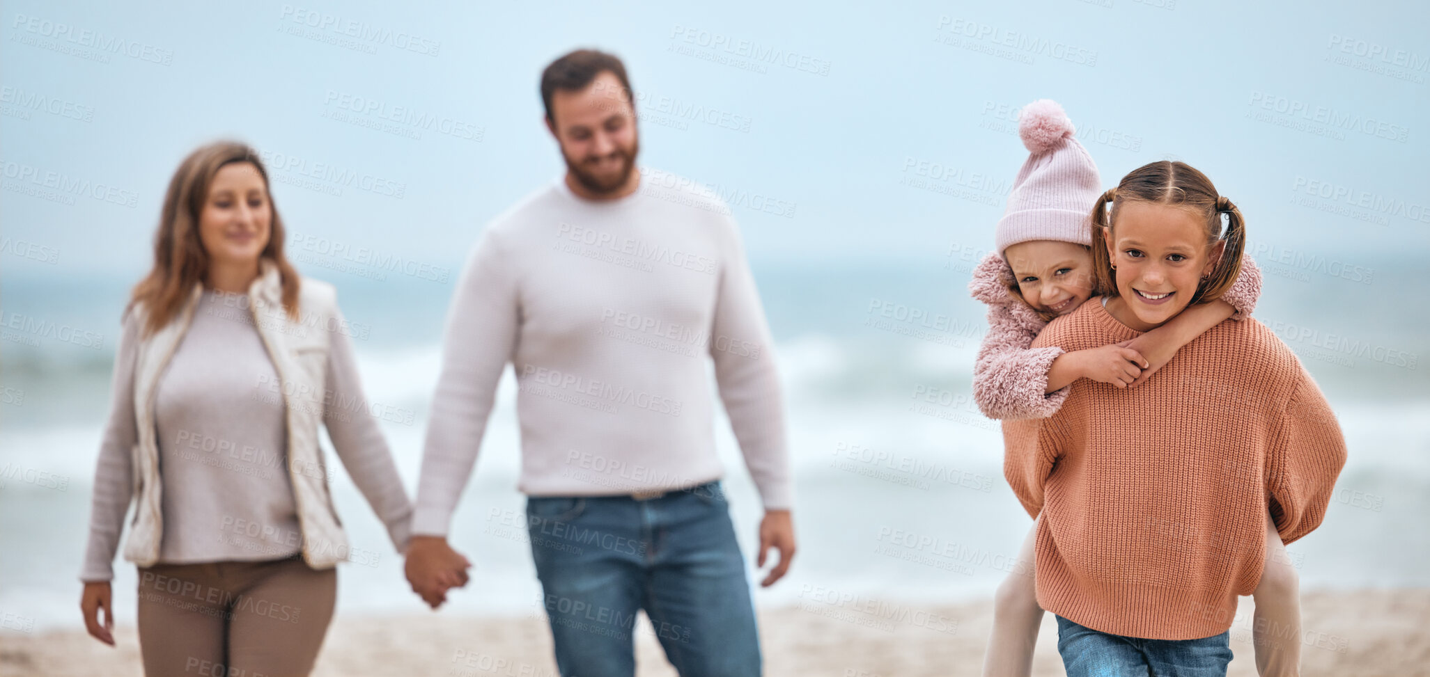 Buy stock photo Family, beach and love, travel and adventure with parents holding hands and kids piggy back, walking by the ocean. Together out in nature, sea and mother, father and children have fun bonding.