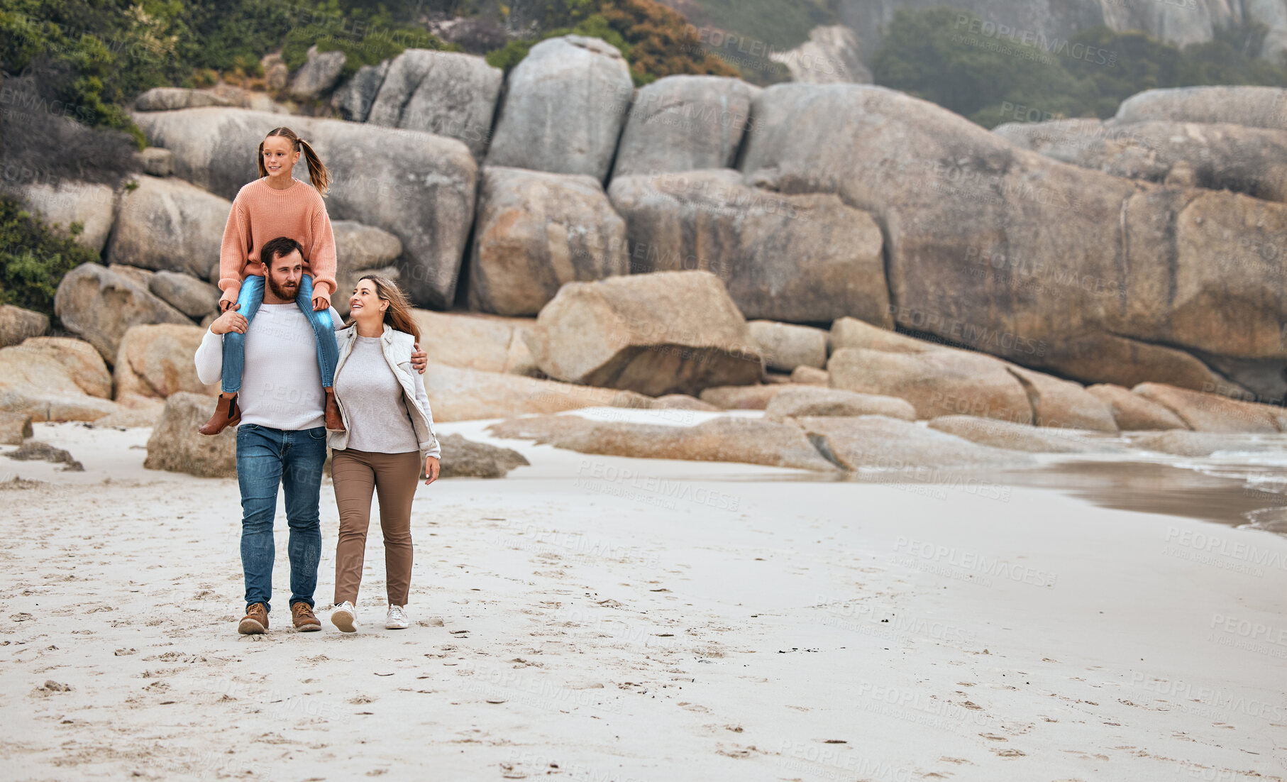 Buy stock photo Family, walking and beach, travel and outdoor, mother and father with child spending quality time by the ocean. Love, together and man with woman and girl, parents bonding with kid out in nature.