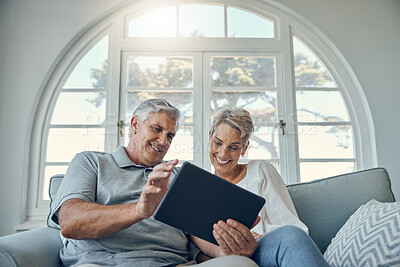 Buy stock photo Senior couple tablet, relax smile and living room sofa for social media, email or internet video. Woman man retirement, home happiness with mobile technology and comic social network on web app