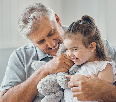 Buy stock photo Grandfather play with grandchild girl in living room, lounge and family home with teddy bear toys, fun and happiness in Australia. Happy senior grandparent man relax with young kids together in house