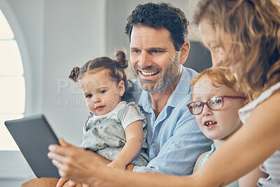 Buy stock photo Family, children and tablet on home sofa for elearning, online education and digital teaching software website. Happy mom and dad or man and woman helping kids with ebook or internet game for fun
