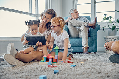 Buy stock photo Tablet, carpet and family with children for elearning, teaching and online games with mother, grandparents and baby in living room. Talking, education and mom helping kids on digital platform at home
