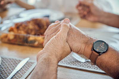 Buy stock photo Holding hands, praying thanks for food and prayer for lunch, dinner table and worship, gratitude and respect in family home. Closeup christian spiritual people, eating together and pray faith in god 