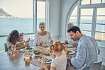 Family, generations and food, eating together in family home by the beach, healthy meal, nutrition and bonding. Big family, parents with grandparents and children eat at house by coast of Australia.