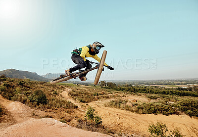 Buy stock photo Mountain bike, man and air jump, action and bicycle cycling, challenge and adventure, freedom and dynamic performance on blue sky mockup. Biker, athlete and adrenaline, energy and extreme sports race