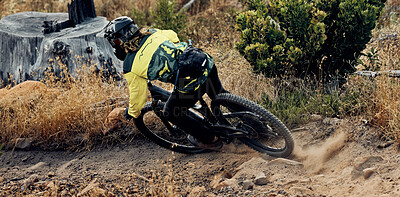 Buy stock photo Mountain bike speed, dust on ground from fast drift turn and race, rally or competition outdoor. Extreme sports cycling, sand dirt rocks and cyclist man, ride to win contest or downhill on mountain