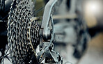 Cycling speed, bicycle gears and chain, cycle speed mechanic wheels of metal, iron or steel closeup. Mountain bike back wheel, extreme sports and fitness exercise riding on outdoor adventure trail.