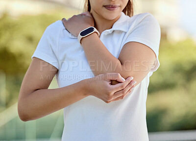 Buy stock photo Tennis elbow, sports and a woman with injury, fitness and training game on court. Workout, sport exercise and healthcare, tennis player girl with arm pain or inflammation, accident at outdoor match.