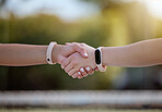 Handshake closeup, teamwork and sports watch fitness collaboration, partnership or agreement after game. Athletes greeting, well done exercise wellness and goal motivation or healthy competition win