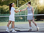Tennis, handshake and women at net for game, fitness and competition training on summer weekend. Sports, workout and hand shake, girl friends smile and happy on tennis court say thank you after match