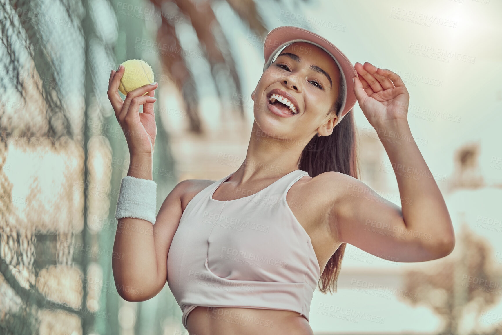 Buy stock photo Happy, woman and tennis ball with smile for sports, exercise or fun workout in the summer outdoors. Portrait of female in sport fitness smiling for healthy cardio, tennis or training at the court