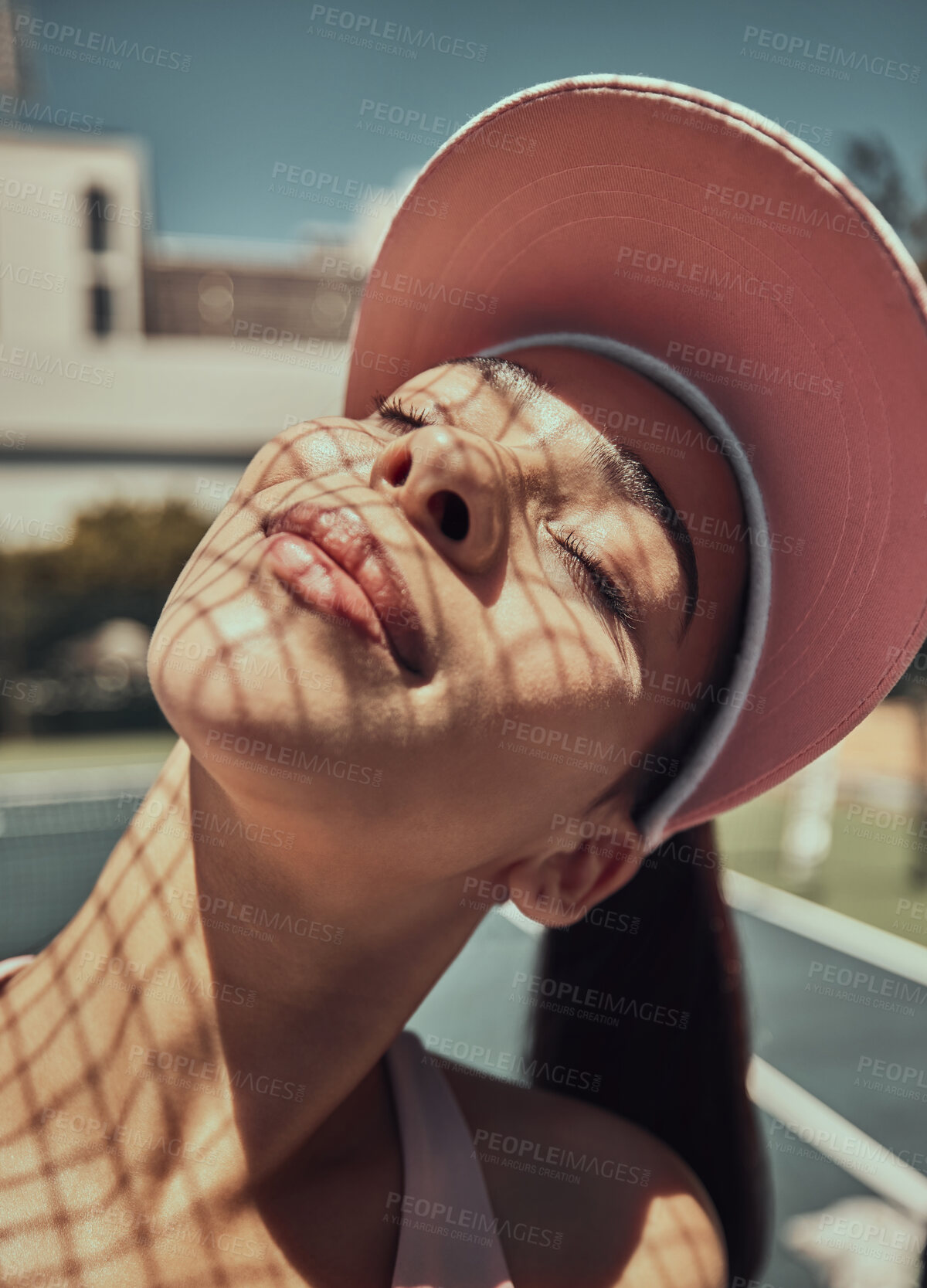 Buy stock photo Young woman, sunshine and happy outdoor, content and enjoy summer vacation for wellness, health and balance. Confident female, sunlight and with hat to cover face, happiness and with smile for joy