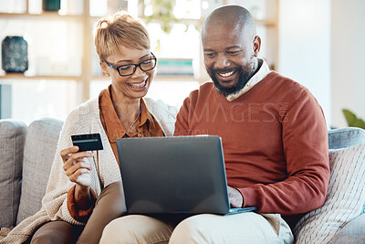 Buy stock photo Laptop, credit card and online shopping with a black couple customer spending money or banking at home together. Computer, ecommerce and retail with a mature man and woman shopper in a house