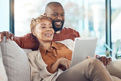 Buy stock photo Senior black couple, tablet on sofa or reading social network, email or communication with smile. Mature black woman, happy black man on mobile technology and social media, relax on web app in home