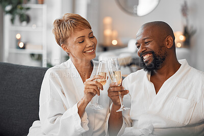 Buy stock photo Black couple, champagne and hotel to celebrate marriage, love and happiness with celebration toast to relax. Man and woman at spa with drink or wine glass, hospitality and fun on vacation or holiday