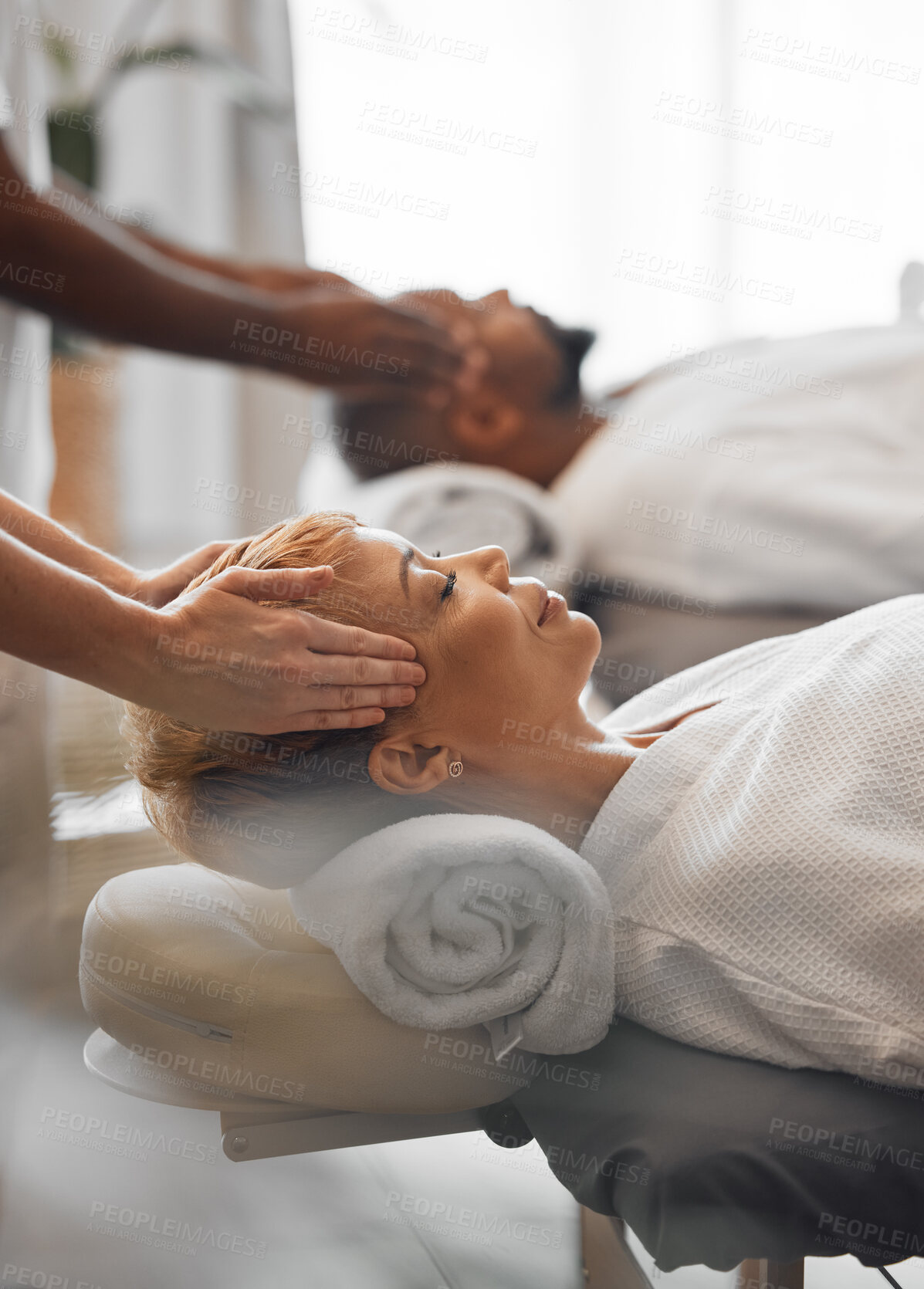 Buy stock photo Hands, head and massage with a woman customer in a spa to relax for wellness or luxury. Face, beauty and therapy with a mature female customer and masseuse in a health clinic for stress relief