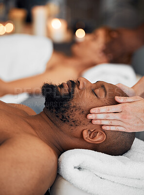 Buy stock photo Spa, black man and woman, massage, relax and romantic for  peaceful, focus and calm.  African American couple, wellness and enjoy retreat for health with luxury holiday, stress relief or lay on table