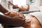 Spa, wellness and black woman getting massage with massage therapist hands and relax with stress relief. Beauty treatment salon, body therapy and relaxation, peace and calm with luxury service.