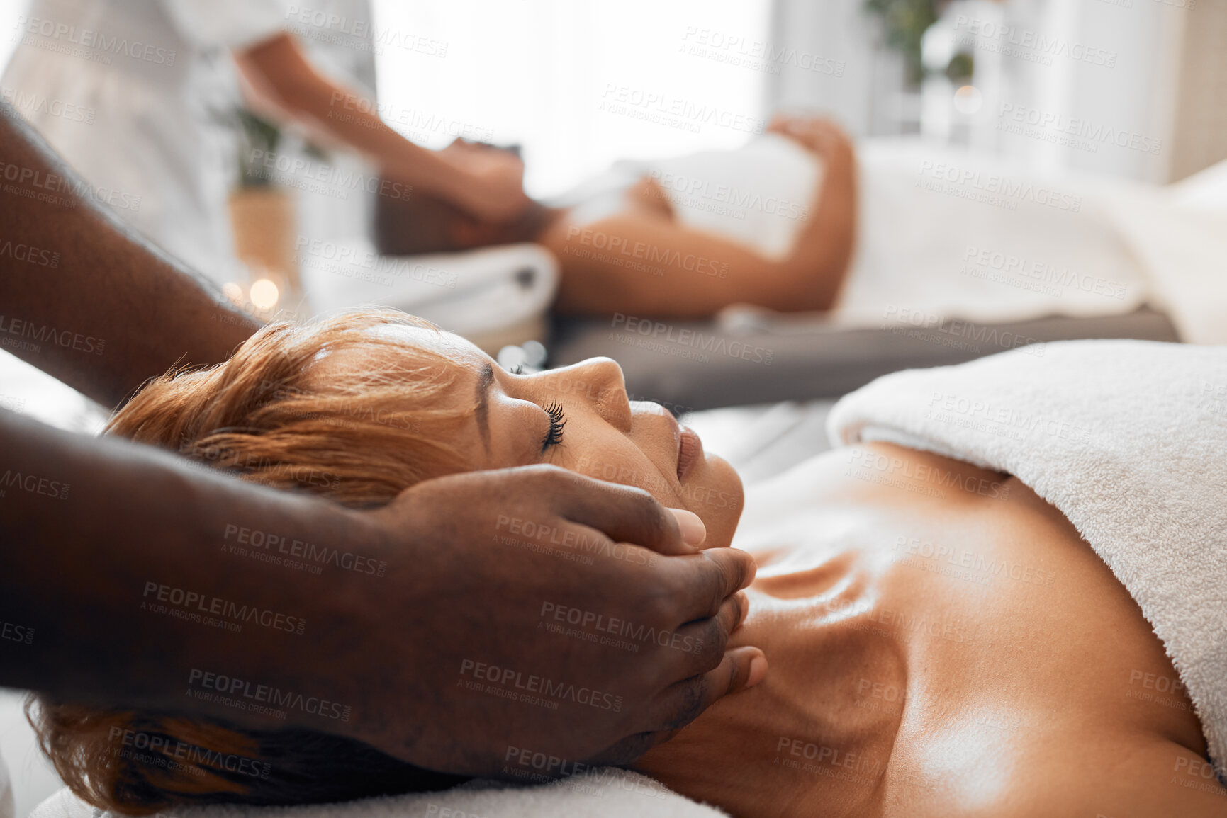 Buy stock photo Spa, wellness and black woman getting massage with massage therapist hands and relax with stress relief. Beauty treatment salon, body therapy and relaxation, peace and calm with luxury service.