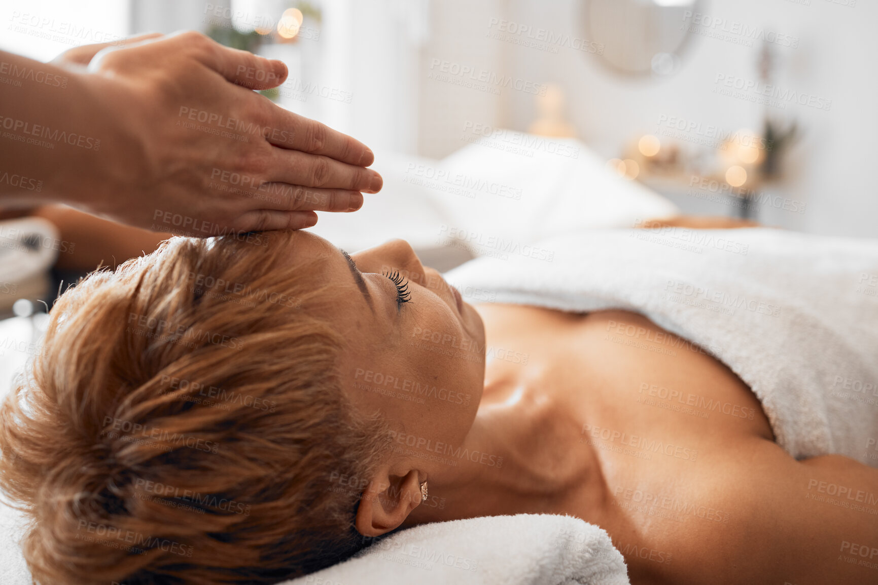 Buy stock photo Spa, black woman and head massage to relax, peaceful and calm for clear mind, wellness and stress relief on table. Senior female, physical therapy and luxury vacation for health, body care and fresh.