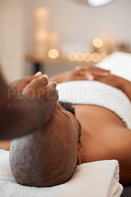 Black man, head massage or relax spa in relax hotel, wellness salon or luxury resort for self care, mental health or peace. Massage therapist, hands and zen aromatherapy for healthy stress management
