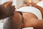 Spa, African man and masseuse hands for head massage, mental health and body wellbeing. Calm, relax and luxury beauty skincare wellness, physical therapy treatment or peaceful facial skin detox