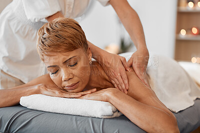 Buy stock photo Hands, relax and black woman at a spa for a massage for back pain and body physical therapy. Relaxing, massage therapist and peaceful person resting and enjoys healthy luxury healing oil treatment